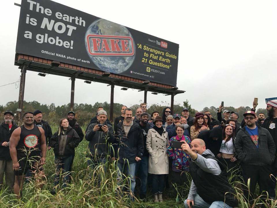 Flat Earth Conference Goers with Billboard in North Carolina 2017